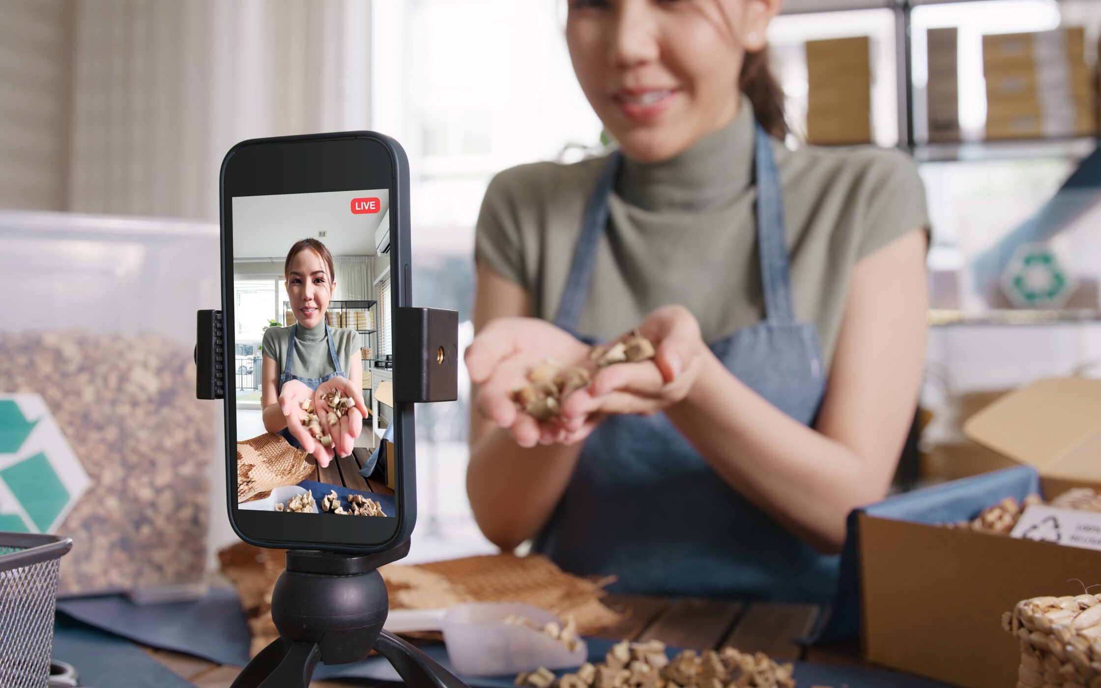 A Woman shooting content for her business